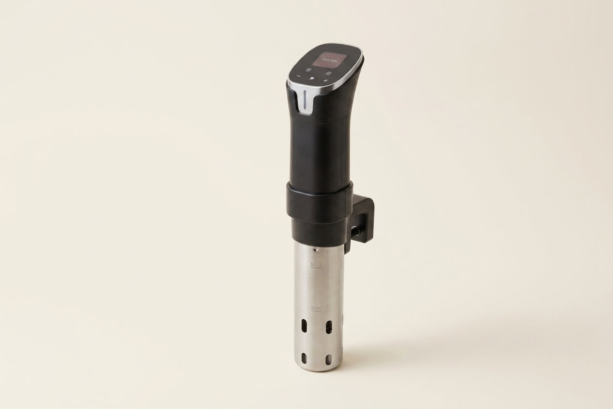 The Searlume Precision Cooker photographed against a warm neutral studio background